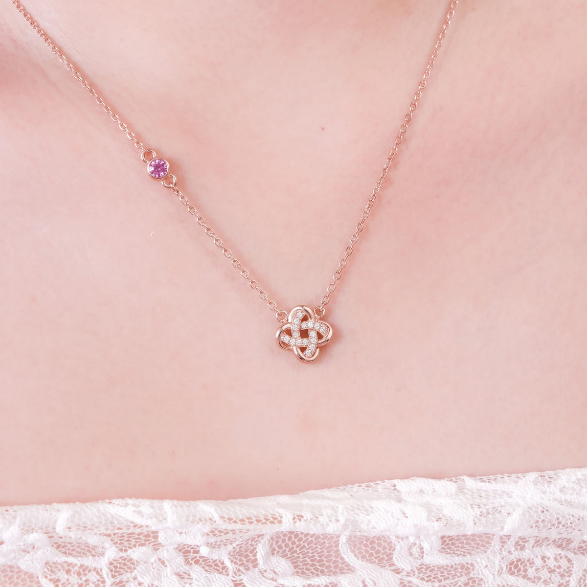 Lamuse women's silver necklace, plated with 18K rose gold, features a fashionable and elegant four-leaf clover design symbolizing good fortune