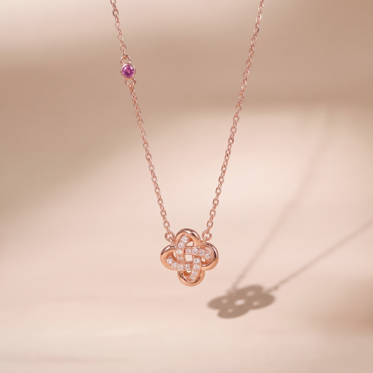 Lamuse women's silver necklace, plated with 18K rose gold, features a fashionable and elegant four-leaf clover design symbolizing good fortune