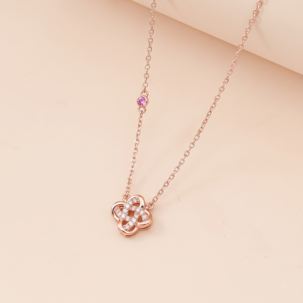 Lamuse women's silver necklace, plated with 18K rose gold, features a fashionable and elegant four-leaf clover design symbolizing good fortune